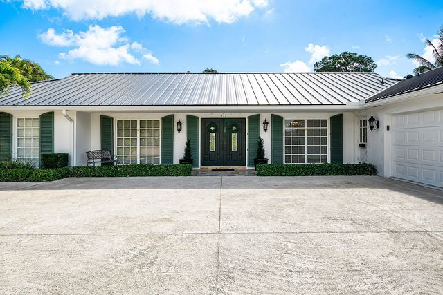 417 N Country Club Drive, Atlantis, FL 33462