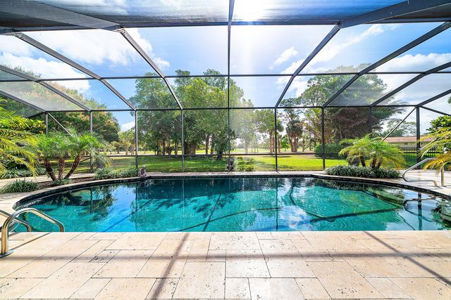 417 N Country Club Drive, Atlantis, FL 33462