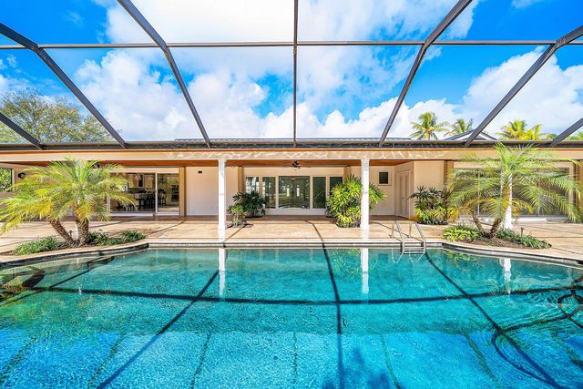 417 N Country Club Drive, Atlantis, FL 33462