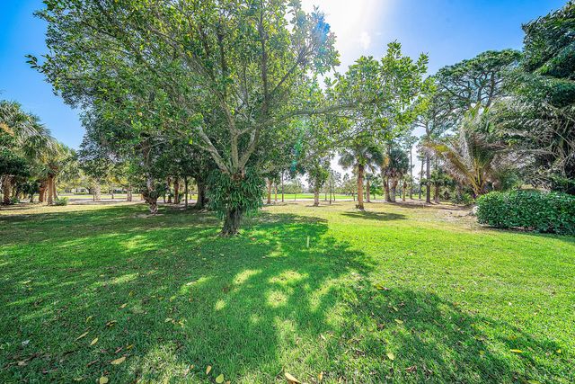 417 N Country Club Drive, Atlantis, FL 33462