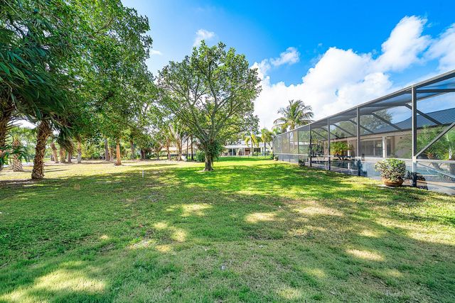 417 N Country Club Drive, Atlantis, FL 33462