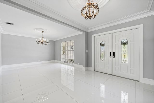 417 N Country Club Drive, Atlantis, FL 33462