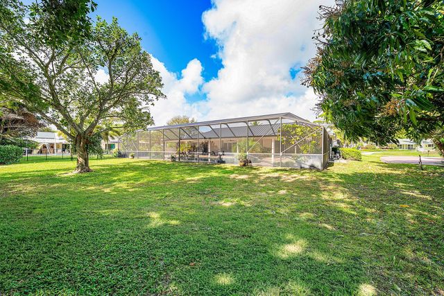 417 N Country Club Drive, Atlantis, FL 33462