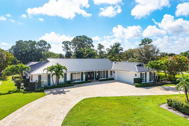 417 N Country Club Drive, Atlantis, FL 33462