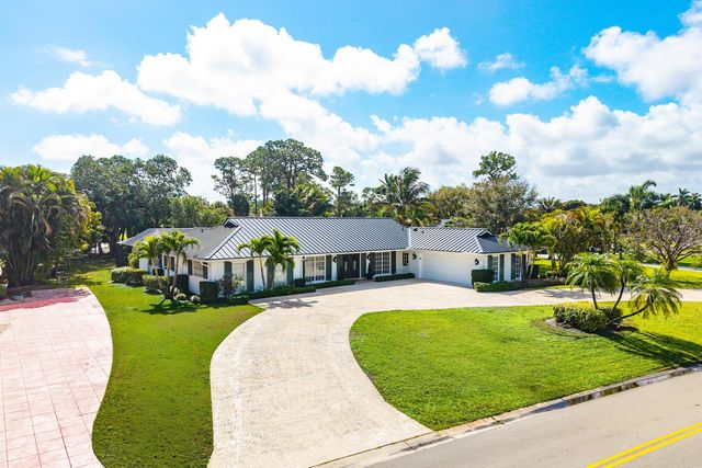 417 N Country Club Drive, Atlantis, FL 33462