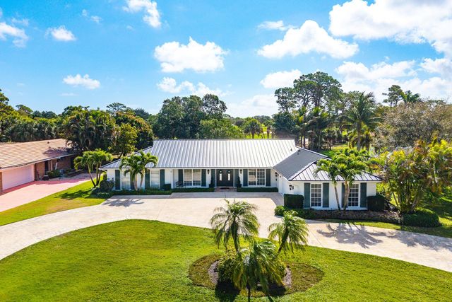 417 N Country Club Drive, Atlantis, FL 33462