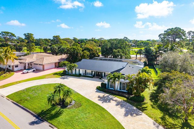 417 N Country Club Drive, Atlantis, FL 33462