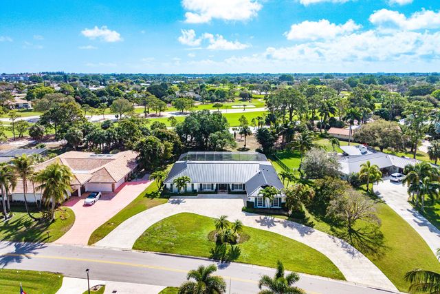 417 N Country Club Drive, Atlantis, FL 33462