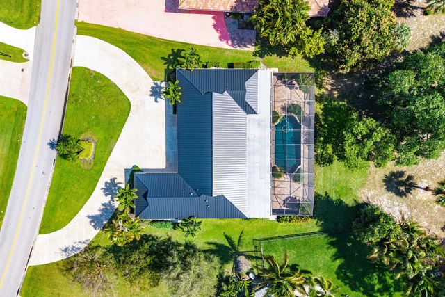 417 N Country Club Drive, Atlantis, FL 33462