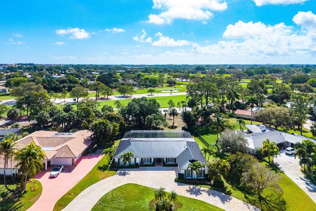 417 N Country Club Drive, Atlantis, FL 33462