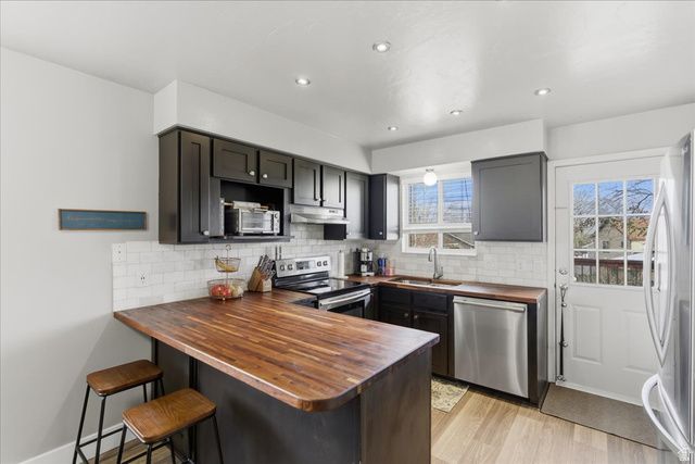 6325 S DRY WIND DR, Taylorsville, UT 84129