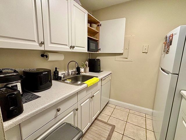 1080 N Benoist Farms Rd 107, West Palm Beach, FL 33411