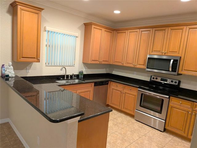 1123 CHERVIL DRIVE, Kissimmee, FL 34759
