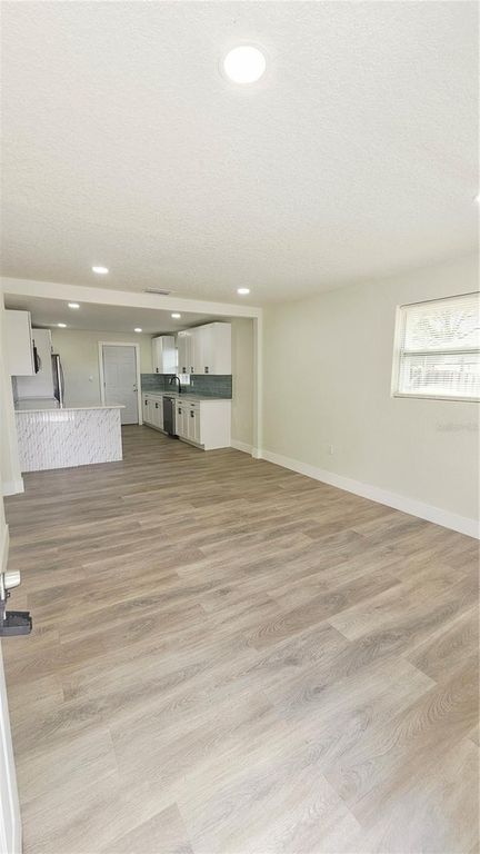 Image 3 of property listing at 8419 N OLA AVENUE, Tampa, FL 33604