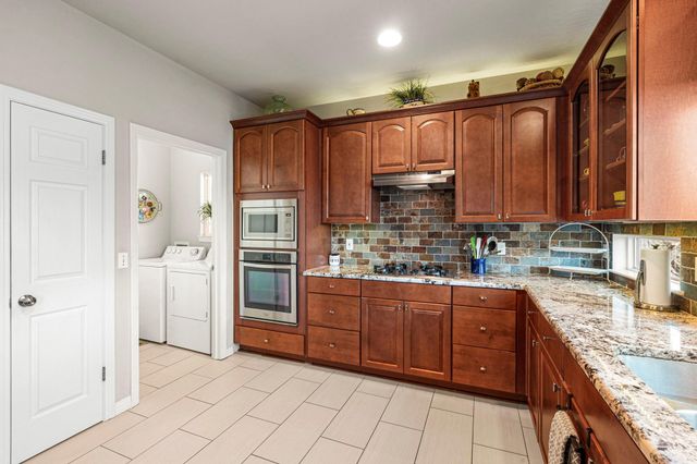 7716 Waldon DR E, Austin, TX 78750