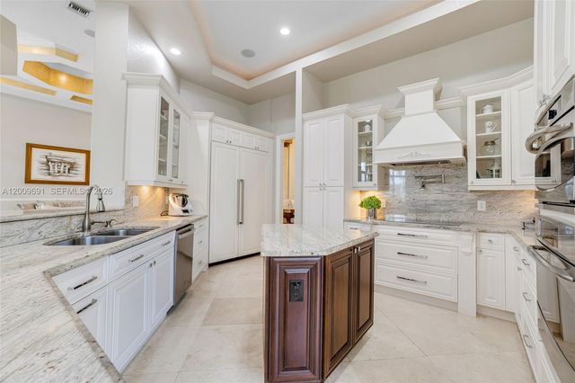 2477 Poinciana Dr, Weston, FL 33327