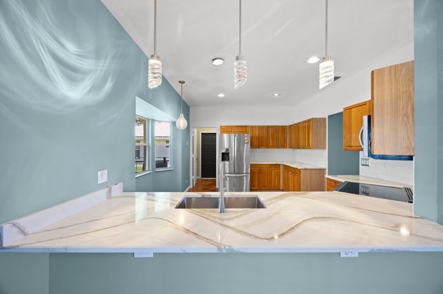 105 Monterey Way, Royal Palm Beach, FL 33411