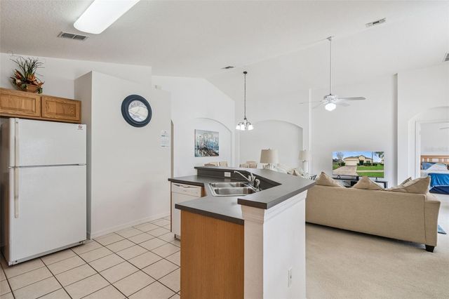 1202 WINDING CYPRESS COURT, Kissimmee, FL 34746