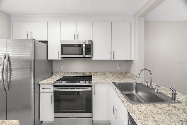 1438 MILLSTREAM LANE 102, Dunedin, FL 34698