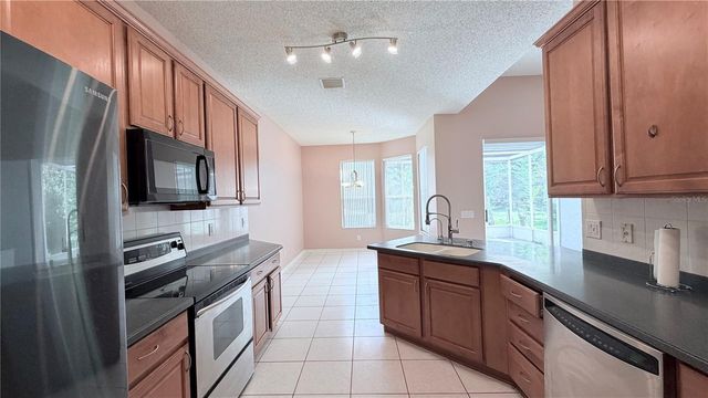 4712 MAPLETREE LOOP, Wesley Chapel, FL 33544
