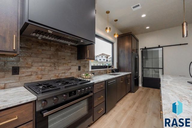 1013 N Scots Pine Dr, Sioux Falls, SD 57110