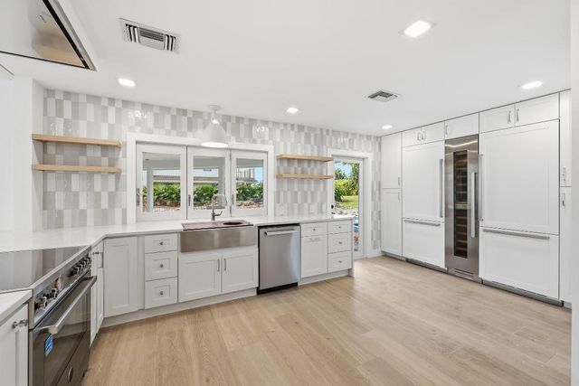 6189 Woodcutter Court, Palm Beach Gardens, FL 33418