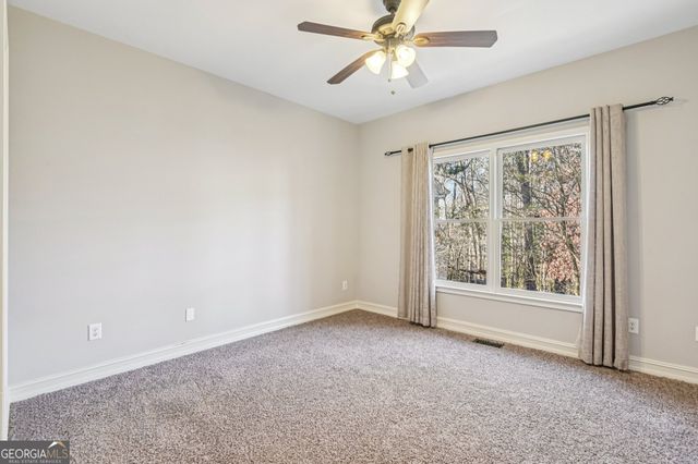 701 Whisper Wind Court, Woodstock, GA 30189