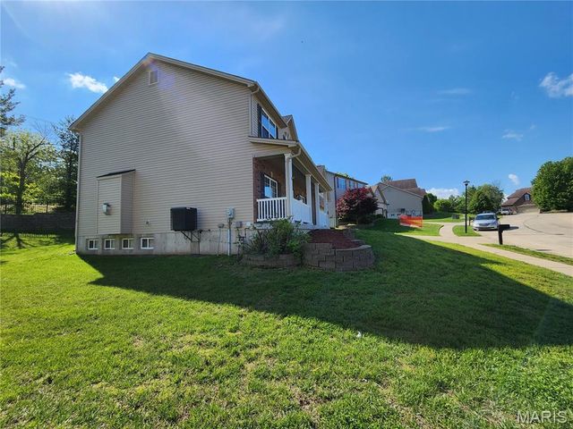 59 Charbonier Bluffs Drive, Florissant, MO 63031
