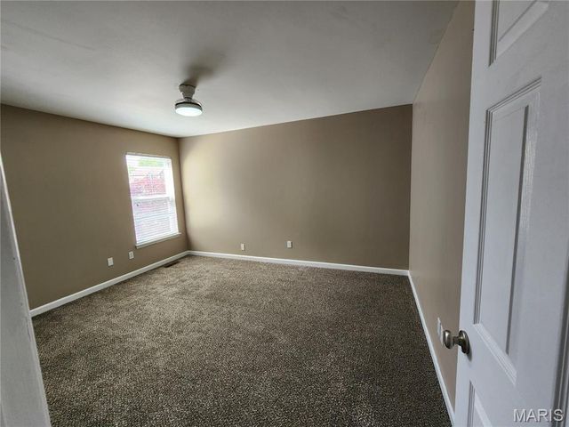 59 Charbonier Bluffs Drive, Florissant, MO 63031