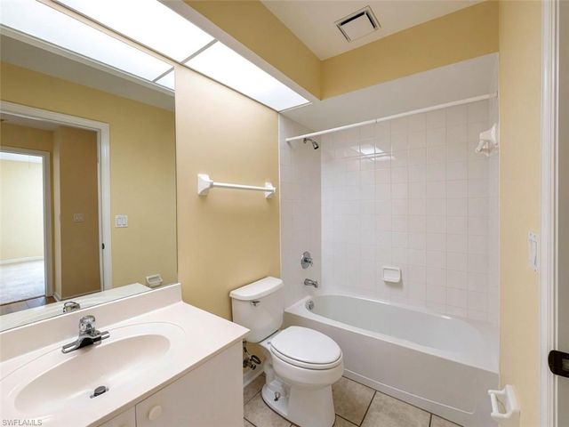 7553 Silver Trumpet LN 202, Naples, FL 34109