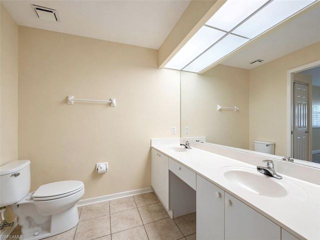 7553 Silver Trumpet LN 202, Naples, FL 34109