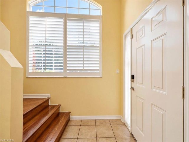 7553 Silver Trumpet LN 202, Naples, FL 34109