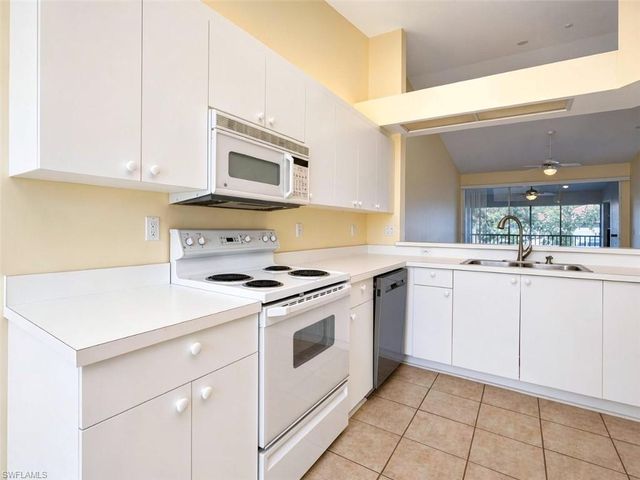 7553 Silver Trumpet LN 202, Naples, FL 34109