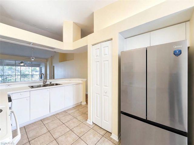 7553 Silver Trumpet LN 202, Naples, FL 34109