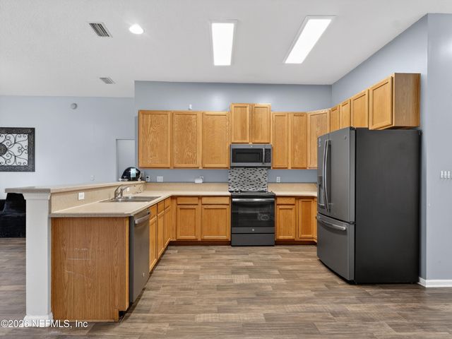 1515 HARVEST COVE Drive, Middleburg, FL 32068