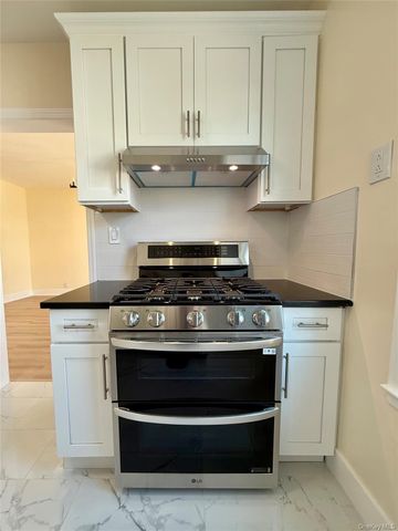 7105 Loubet Street, Forest Hills, NY 11375