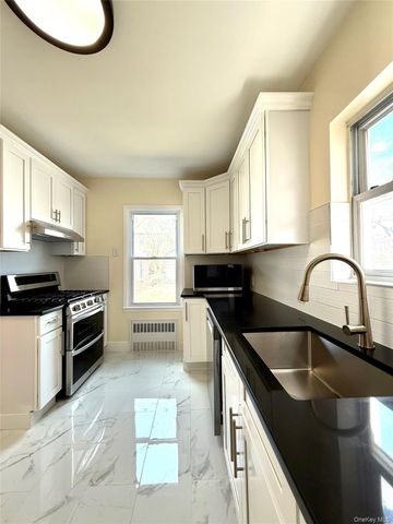 7105 Loubet Street, Forest Hills, NY 11375