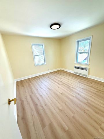 7105 Loubet Street, Forest Hills, NY 11375