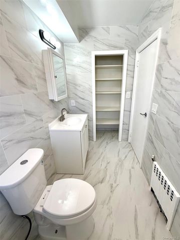 7105 Loubet Street, Forest Hills, NY 11375