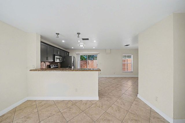 5789 WOODLAND POINT Drive, Tamarac, FL 33319