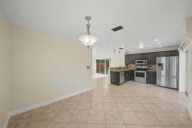 5789 WOODLAND POINT Drive, Tamarac, FL 33319