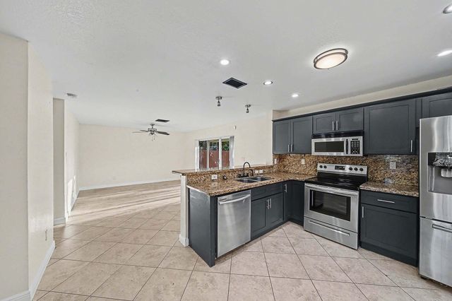 5789 WOODLAND POINT Drive, Tamarac, FL 33319