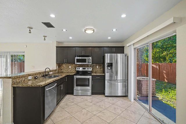 5789 WOODLAND POINT Drive, Tamarac, FL 33319