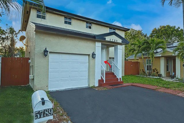 5789 WOODLAND POINT Drive, Tamarac, FL 33319
