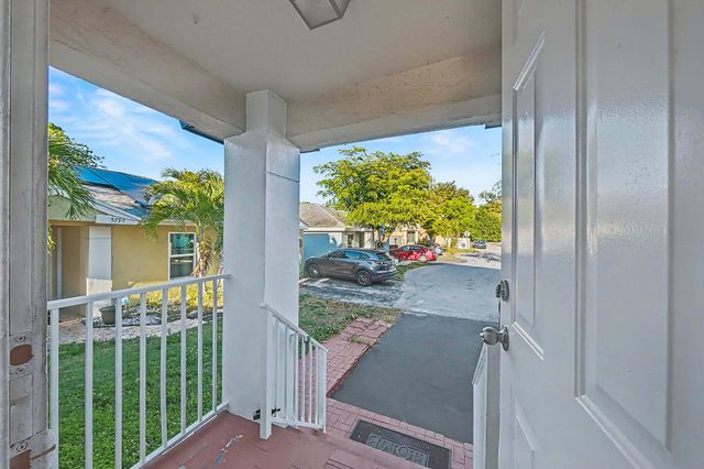 5789 WOODLAND POINT Drive, Tamarac, FL 33319