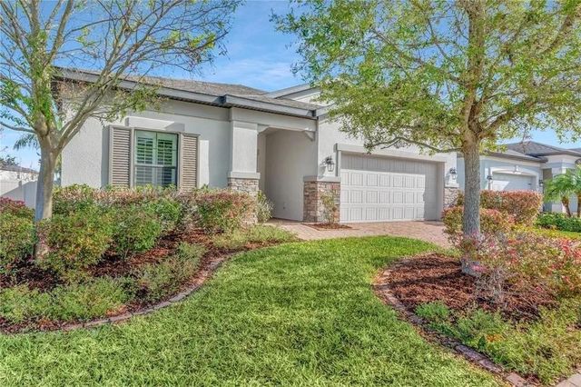 1607 FEATHER GRASS LOOP, Lutz, FL 33558