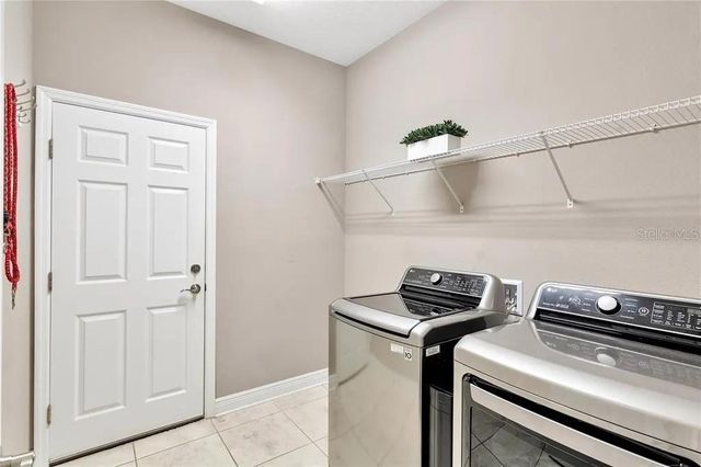 1607 FEATHER GRASS LOOP, Lutz, FL 33558