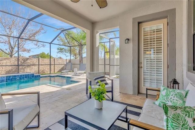 1607 FEATHER GRASS LOOP, Lutz, FL 33558