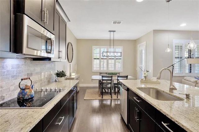 1607 FEATHER GRASS LOOP, Lutz, FL 33558