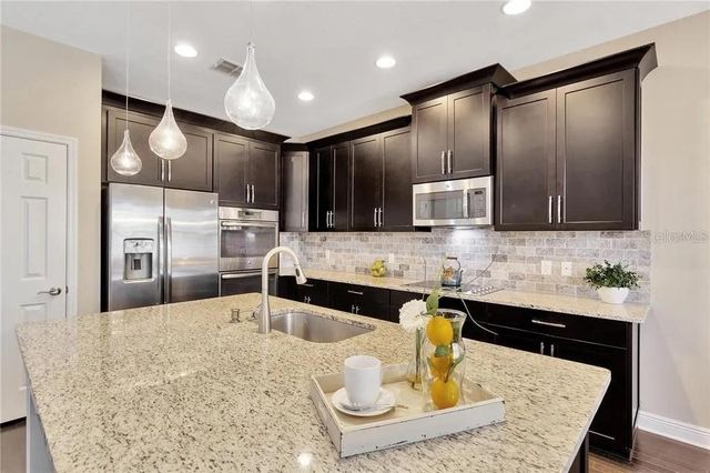 1607 FEATHER GRASS LOOP, Lutz, FL 33558